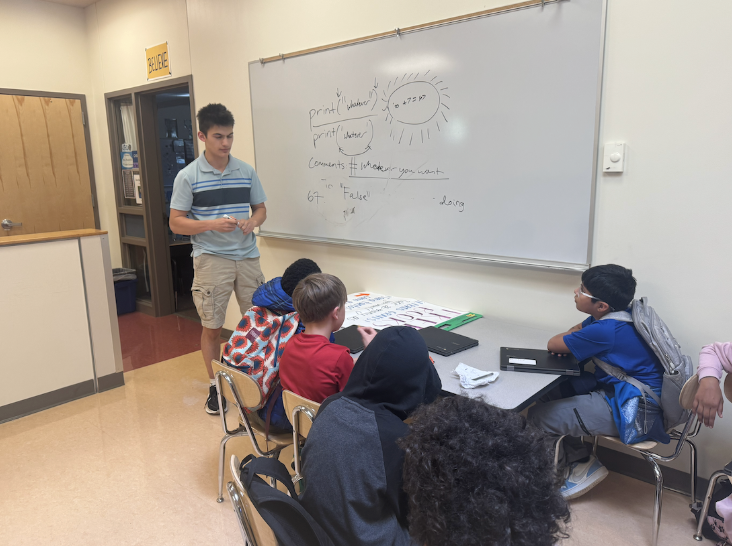 Students participating in an AI in STEM classroom workshop
